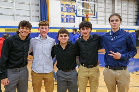 Five players standing together after the ceremony