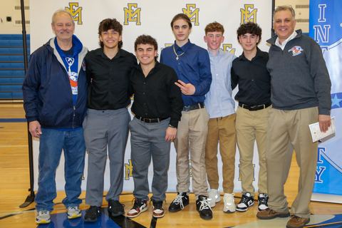 The full group of players and coaches at the end of the awards ceremony